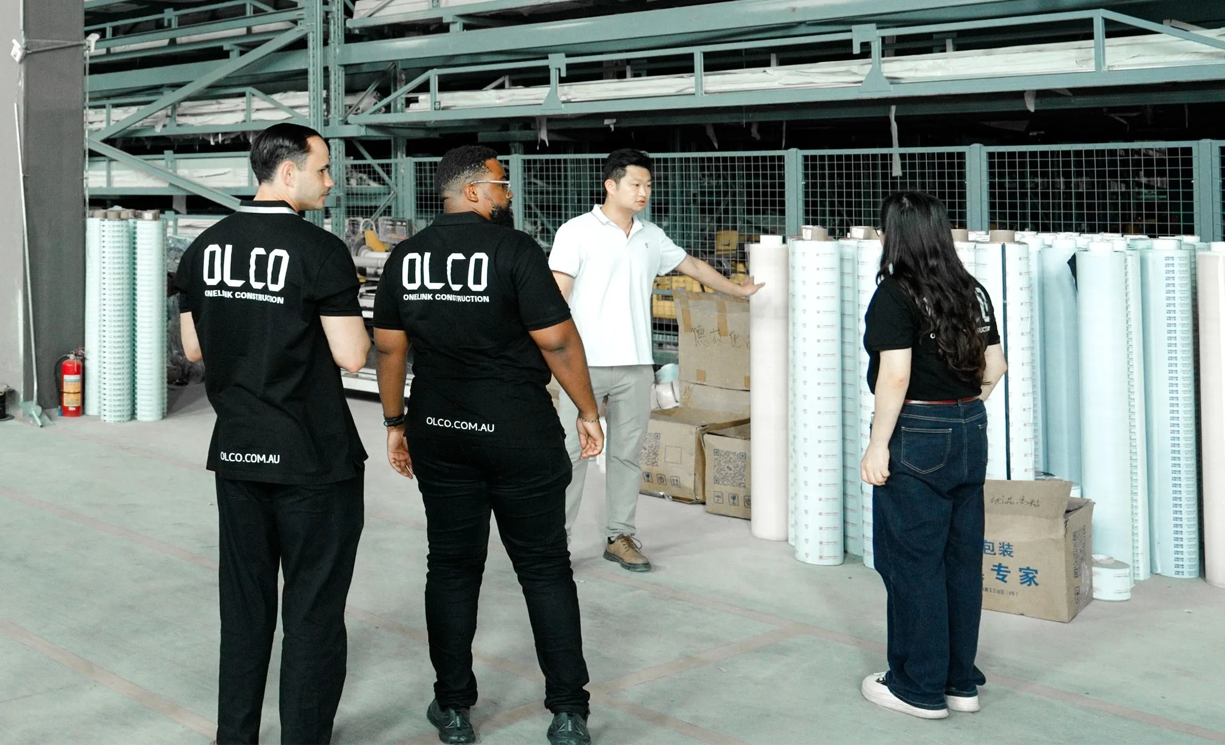 OLCO team greeting a client inside the Brisbane showroom