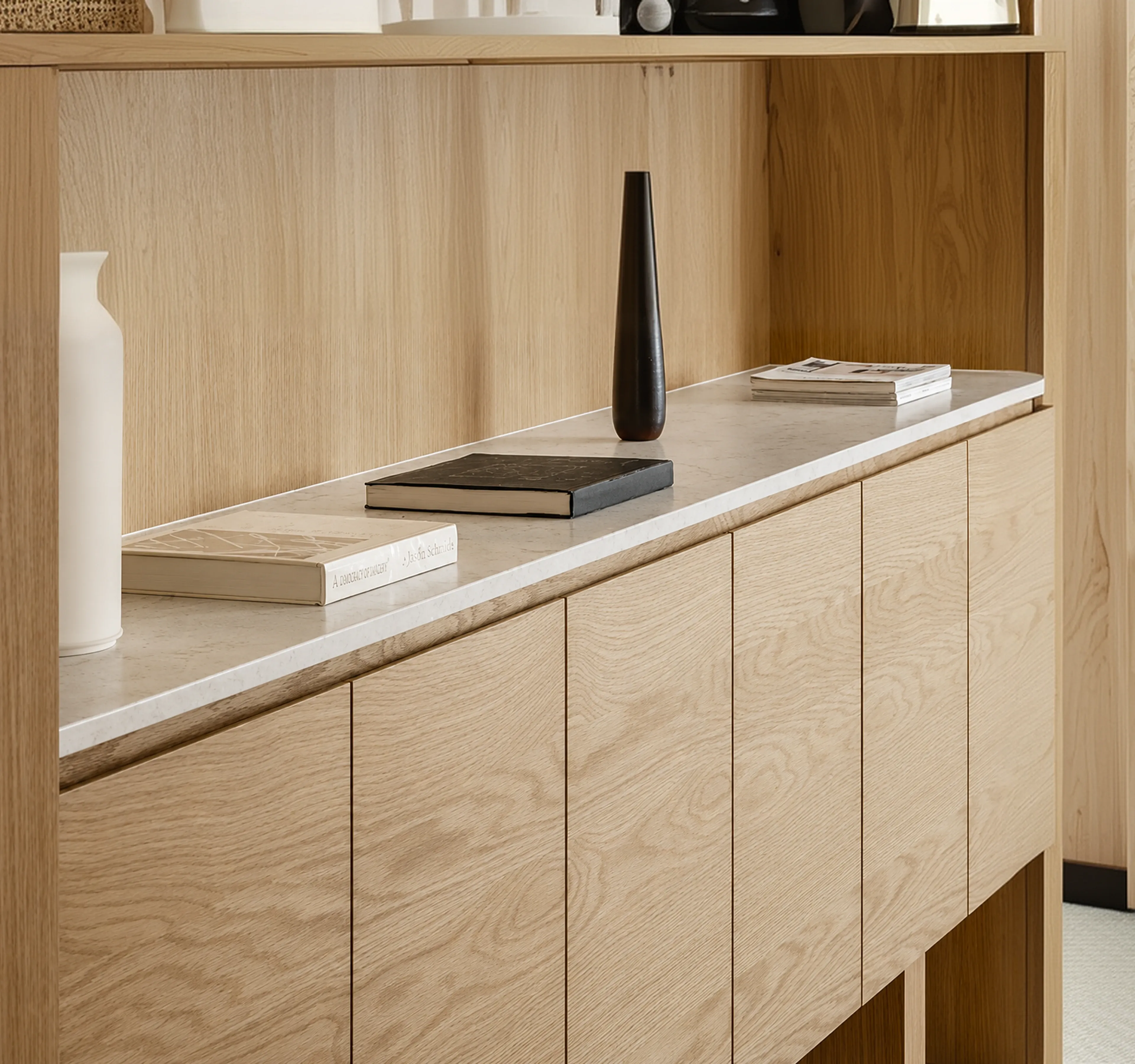 Custom joinery with a stone benchtop in a residential interior